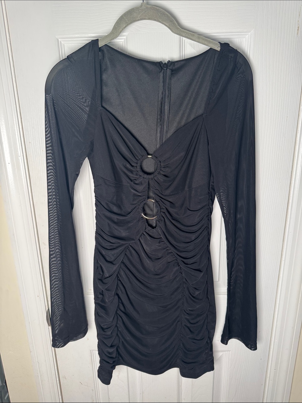 Ruched Black Long-Sleeve Mini Dress with Ring Accents